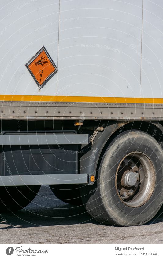 Truck transporting explosives, danger label according to the ADR identifies explosives in the transport of dangerous goods. truck transportation explosion