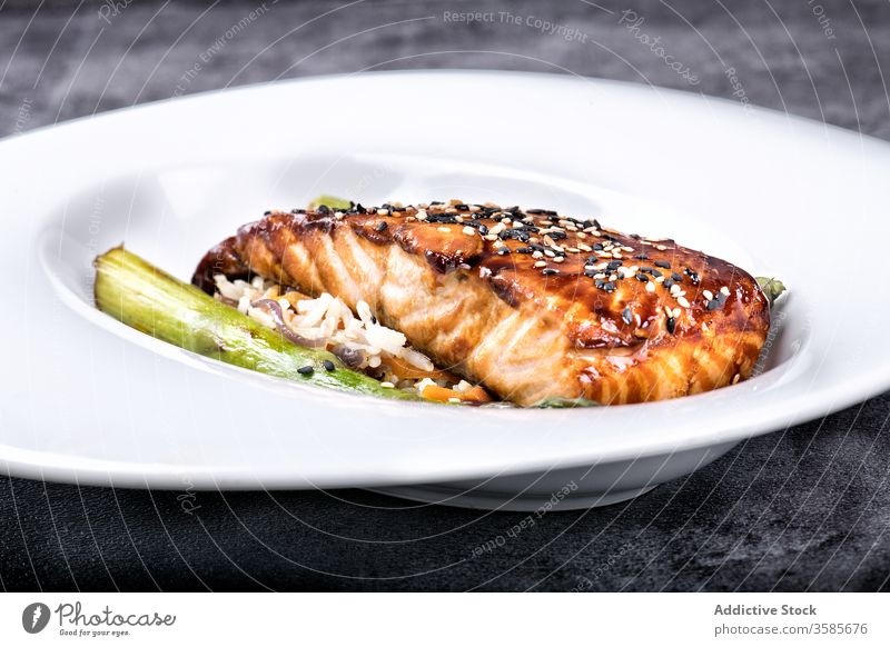 Grilled salmon steak with sesame dish restaurant fish honey vegetable food grill delicious culinary meal serve tasty gourmet fresh organic gastronomy glaze