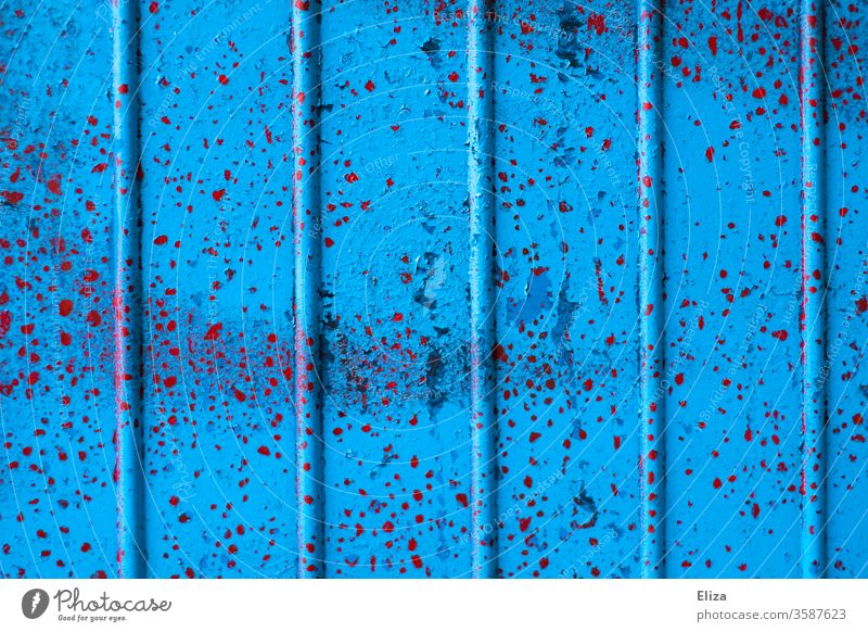 Blue metal background with red speckles Red Mottle Metal texture structure lines Vertical subdivided graphically Abstract Colour worn-out Patina Grunge urban