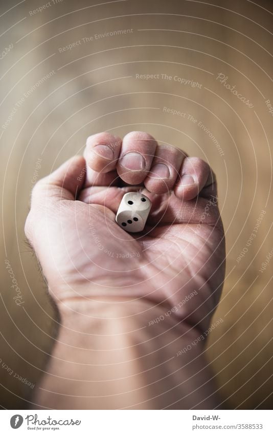 hold a die by hand Man stop To hold on cubes Throw dice gambling luck pitch wish game Addiction addictive lucky devil Jinx Playing Player Game of chance Success