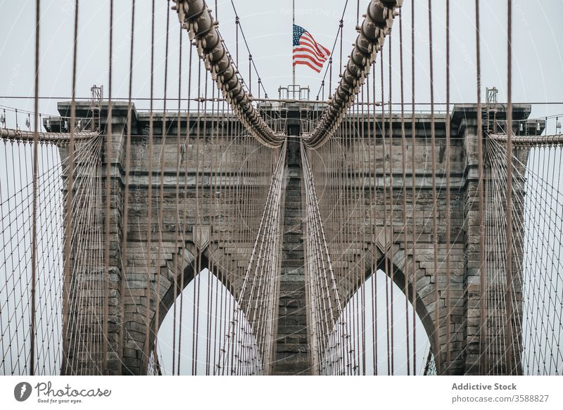 Detail of Brooklyn bridge in overcast weather brooklyn bridge tower suspension arch construction stone architecture landmark new york america usa united states