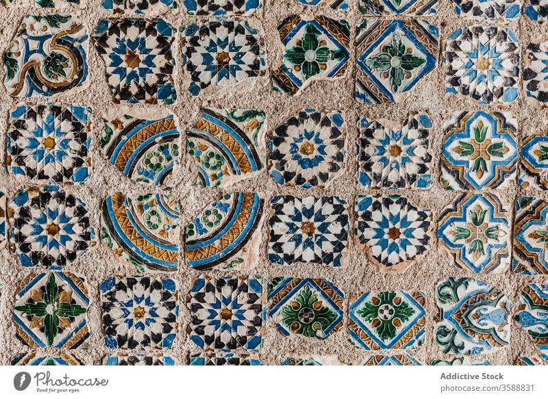 Pattern of colorful mosaic tiles background stone surface ornament weathered city texture old lisbon portugal shabby pattern element detail aged decor grunge