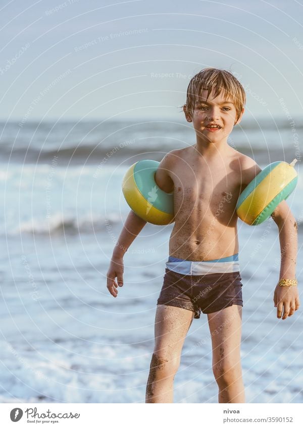 https://www.photocase.com/photos/3590152-young-boy-and-the-ocean-boy-child-photocase-stock-photo-large.jpeg