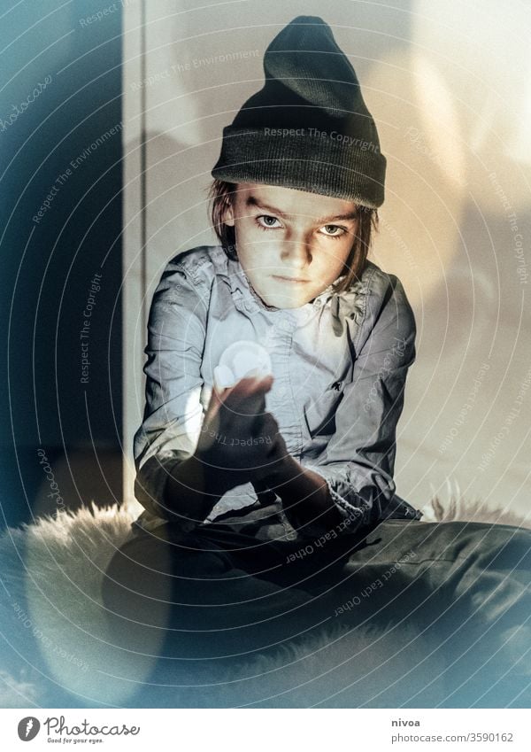 boy with bulb in his hands Boy (child) Child Human being Face Portrait photograph Looking Mouth Joy children Eyes light bulb Magic Magician Colour photo Infancy