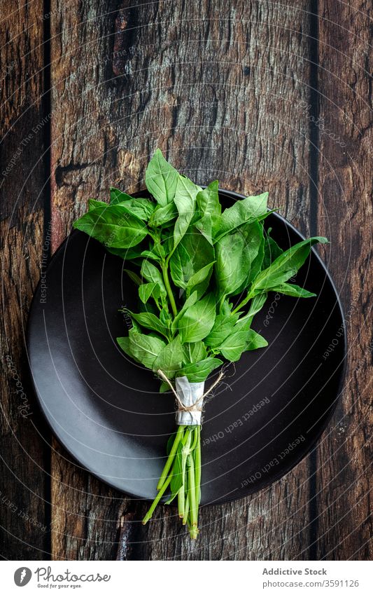 Fresh mint on wooden table herb fresh green aromatic food natural healthy culinary rustic organic ingredient cuisine plant vitamin cook foliage leaf flavor raw