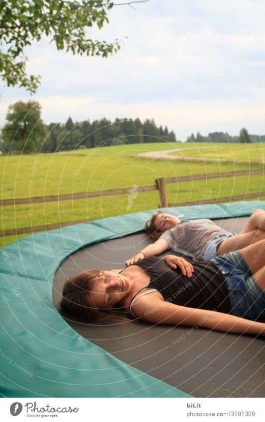 relaxation children girl teenager Youth (Young adults) Lie Sleep rest relaxing Break take a break Rest Goof off chilly Trampoline Dream Daydream Fatigue tired