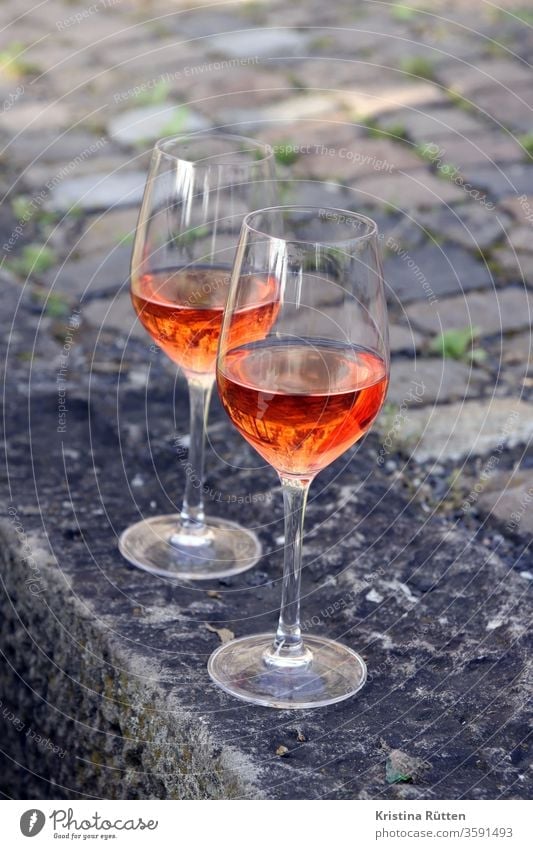 two glasses rosé pink Rose Vine wine glasses Wine glass Glass Glazier Beverage Drinking Aperitif pinkado rosato out Garden Park Picnic aperitif drink drinks