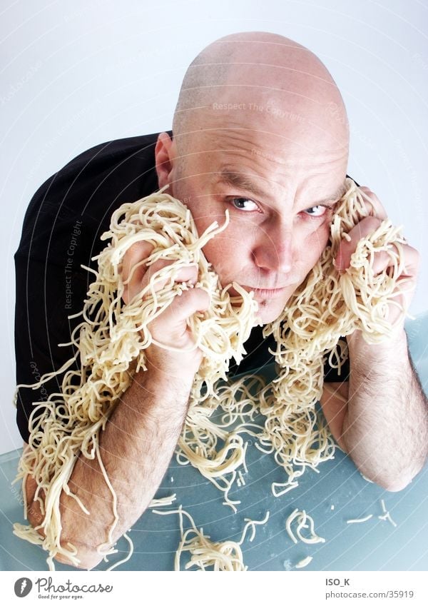pasta eater Noodles Nutrition Lifestyle Bald or shaved head Portrait photograph Playing Food Workshop Man spaghetti studio portrait Blue Face Facial expression
