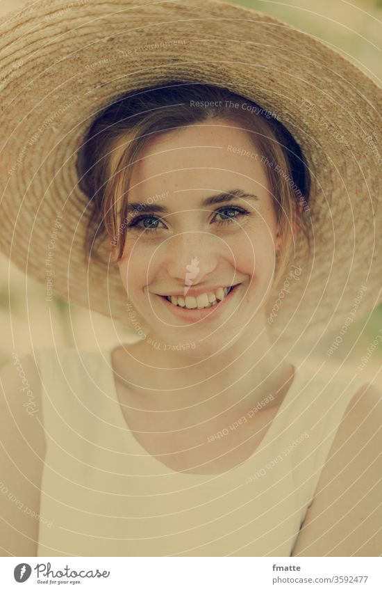 cheerful young woman Woman Laughter Happiness glad Friendliness Friendliness concept Summer Straw hat Summer vacation portrait smile luck Exterior shot Joy