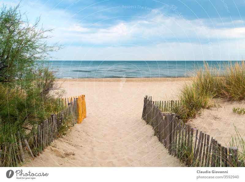 Beach near Montpellier (France) Europe Herault Languedoc-Roussillon beach cloud cloudy color day fence horizon june landscape mediterranean nobody outdoor