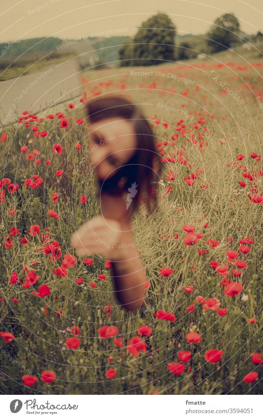 Woman with mirror in a poppy field Mirror Poppy Poppy field Summer flowers