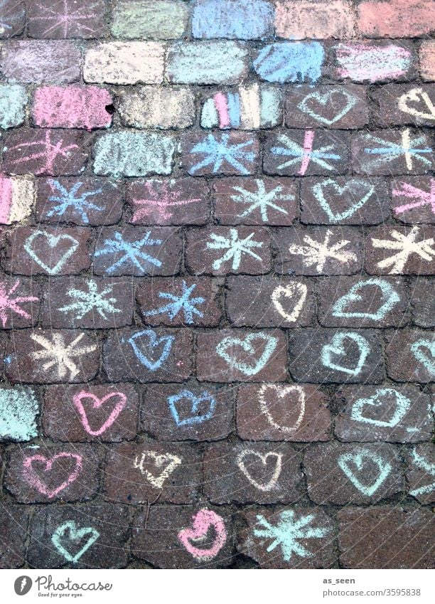 Hearts and stars on the way Stars Chalk Street Drawing Child Childlike Street painting Chalk drawing corona variegated Colour photo Playing Infancy