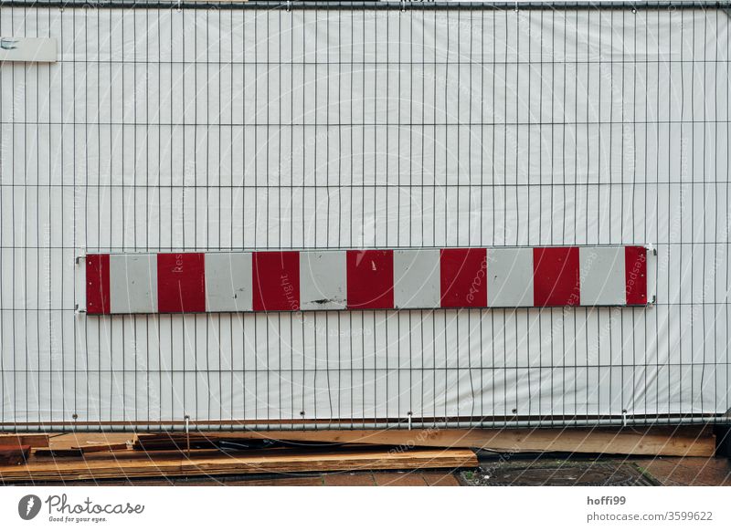 Construction site with opaque barrier and lattice fence cordon Barque Red White tarpaulin Barrier Hoarding Safety Structures and shapes Fence Metal Pattern