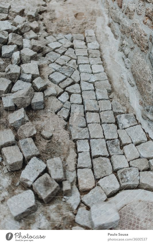 Granite pathway pavement Construction site granite rocks Pavement pavement damages Portugal Paving stone Stone Lanes & trails construction Structures and shapes