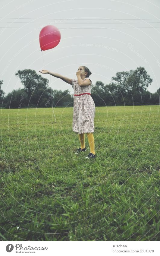 girl in a meadow with a red balloon Meadow Field Nature bushes Grass Child Dress Balloon Playing fly away Summer Retro Infancy Freedom Landscape