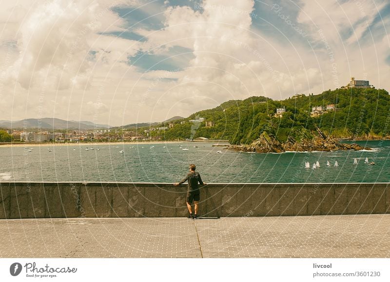 man admiring the landscape in the bay of la concha, san sebastian-spain people one people lifestyle observing looking adult senior adulthood place city seashore