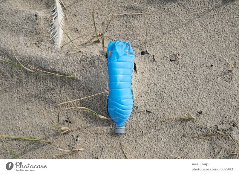 Plastic waste on the beach - bottle, blue Environmental pollution plastic Rubber Trash Ocean Beach Sand Coast Recycling Problem Nature dirt Shackled ecologic