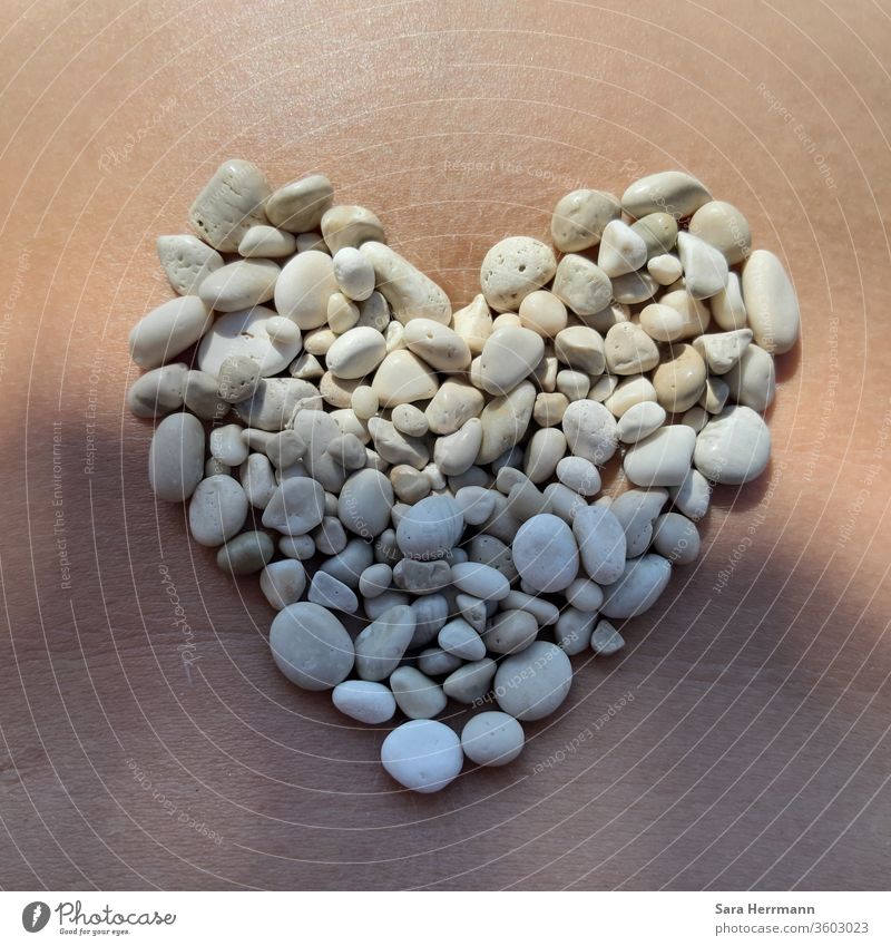 A heart of little stones on my belly Stone Stomach Summer Beach luck White Joy Contentment