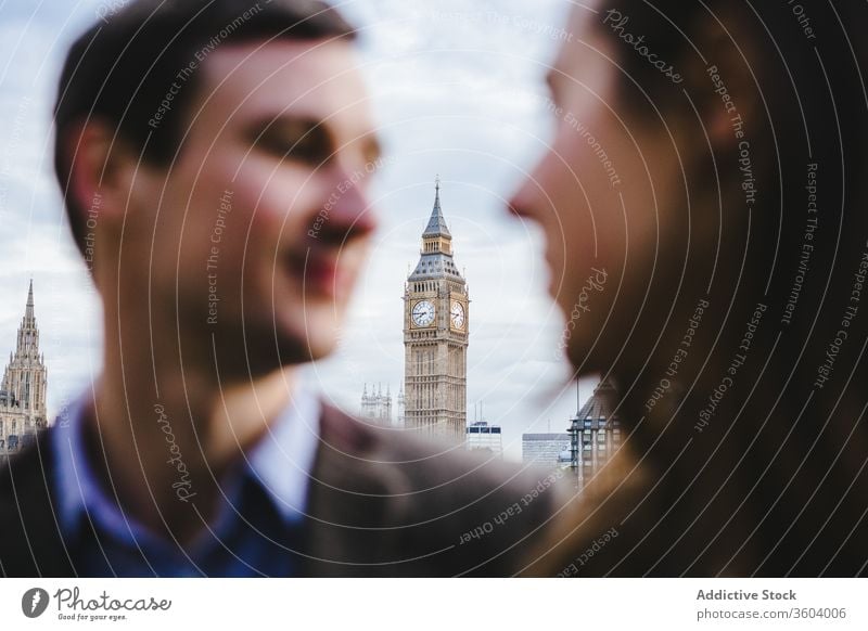 Couple in love during city stroll couple big ben street relationship clock tower together london england united kingdom smile romantic content enjoy landmark