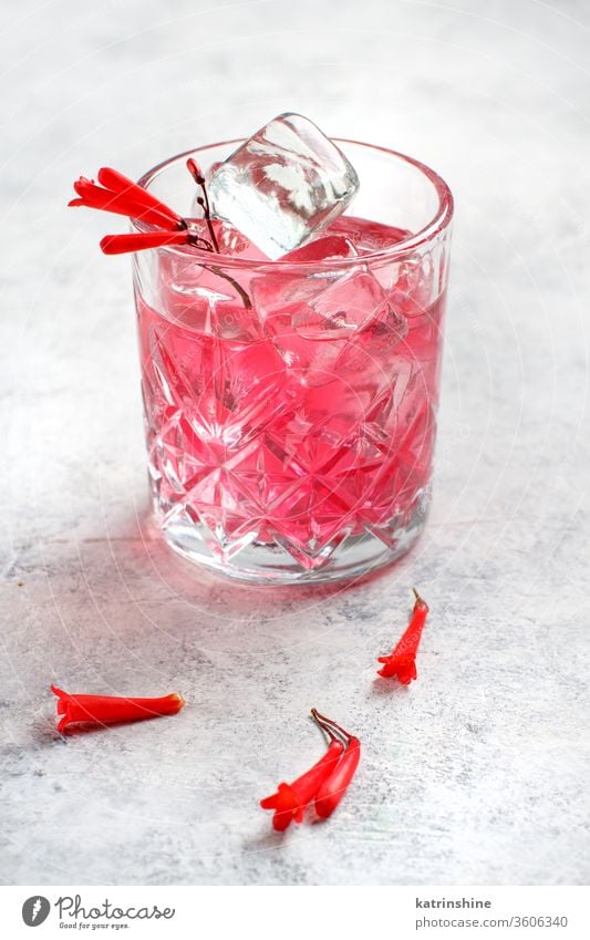 Pink cocktail in a glass decorated with pink flowers cherry Cosmopolitan mocktail analcoholic drink Alcohol Summer Refreshing Party Shiny Beverage Cool Nobody
