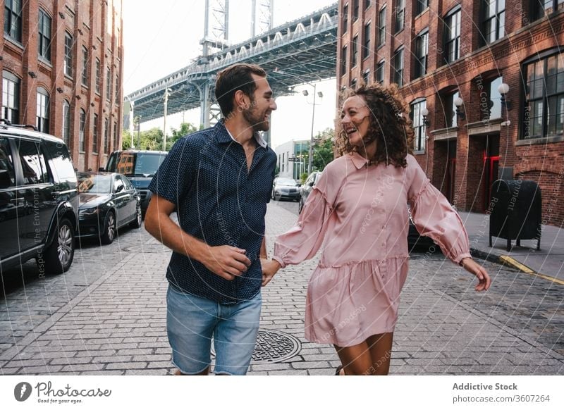 Tender couple walking on the street gentle city stroll together relationship new york america united states usa girlfriend boyfriend smile hug romantic date