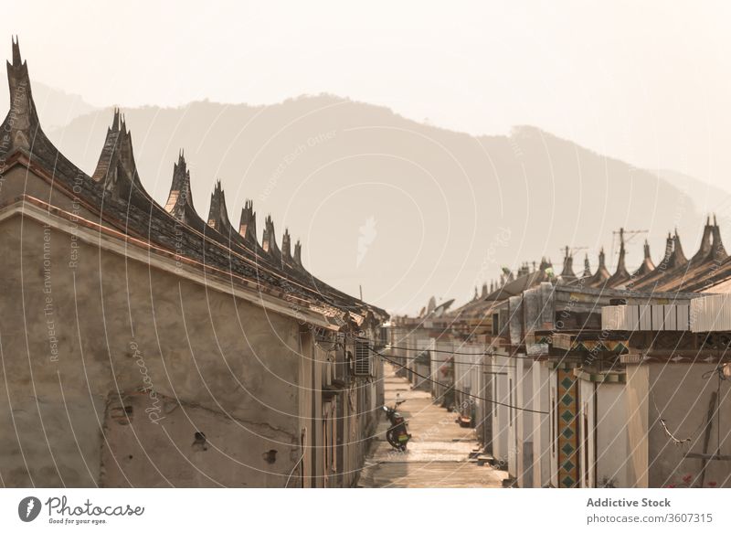 Old street with houses in village narrow stone old building roof tradition ornament daimei china sunrise landmark architecture pathway culture tourism historic
