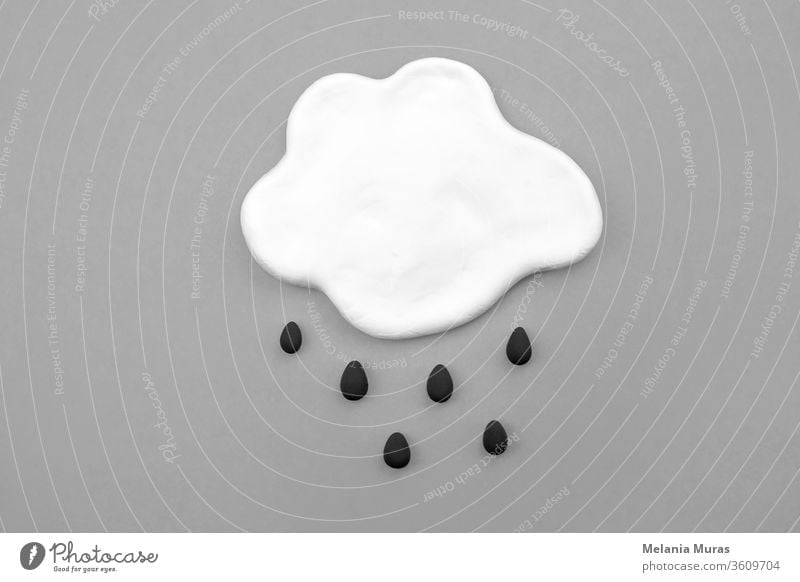 White cloud with rain drops, bad mood concept. Grey, rainy weather, depression, mental health problems. Black and white mock-up. abstract air art atmospheric