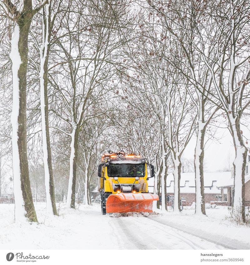 snowplow clearing road, winter service plowing truck driveway blizzard salt clean snowfall cold icy removal storm tractor snowstorm vehicle equipment season