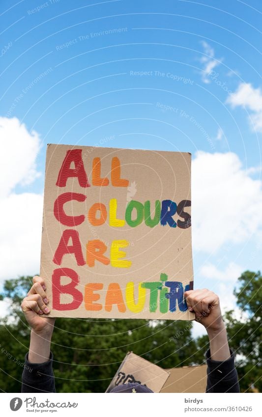 All colours are beautiful.black lives matter - Demonstration in Cologne on 06.06.2020. BLM, blacklivesmatter, against racism and police violence.Colourful writing on a cardboard sign