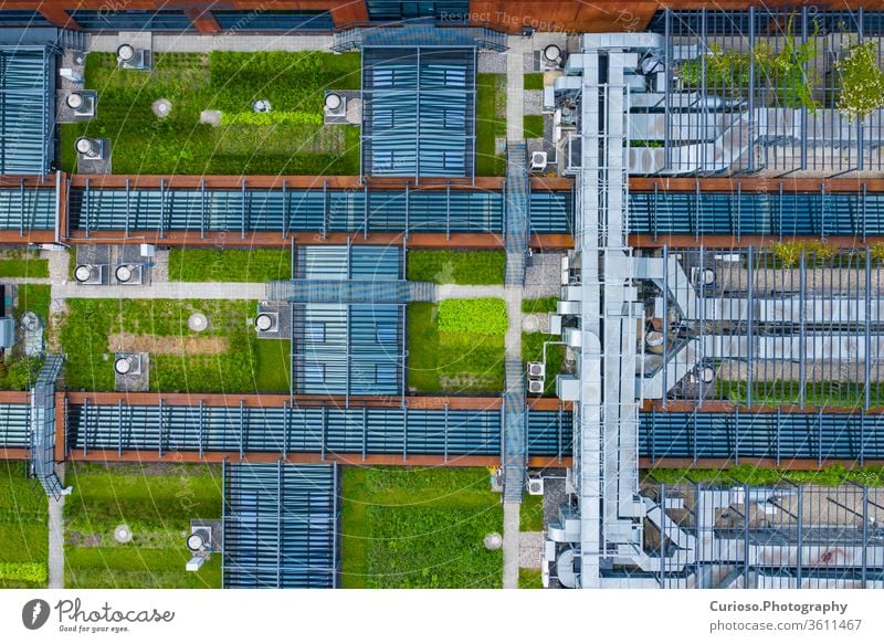 Air Condition Ventilation System Green Grass Ecology. Building Roof. Industrial Air system of ventilation and Air conditioning. Aerial Shot. office energy