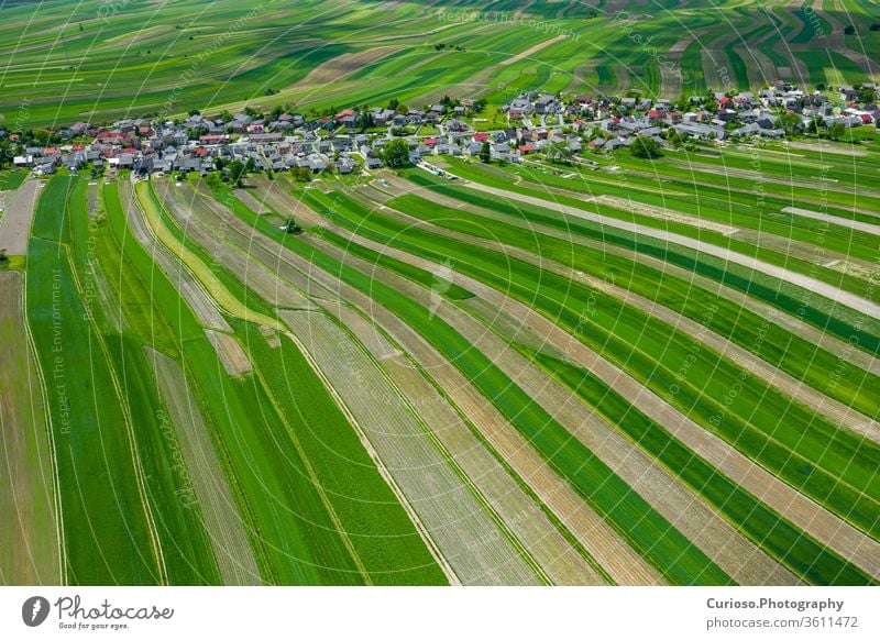 Poland from above. Aerial view of green agricultural fields and village. Landscape with fields of Poland. Typical polish landscape. jura siesian idyllic europe