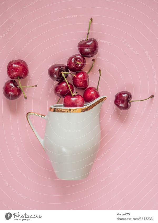 Cherries in white bowl on pink background agriculture berry cherry color eat food fresh freshness fruit garden gourmet healthy ingredient juicy natural nature