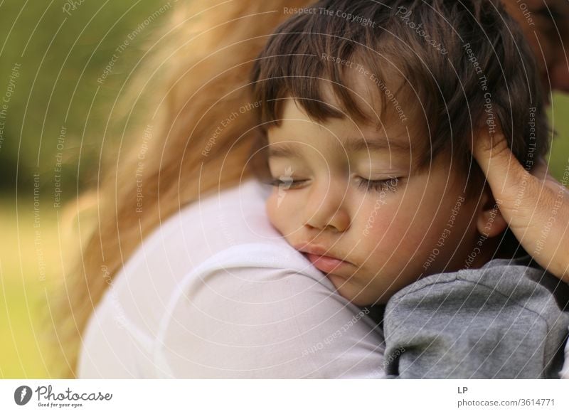 baby sleeping in mothers's arms Sleep Sleeping place Safety Safety (feeling of) Rest Relaxation Dream Child Baby Infancy real people hug Closed eyes Front view