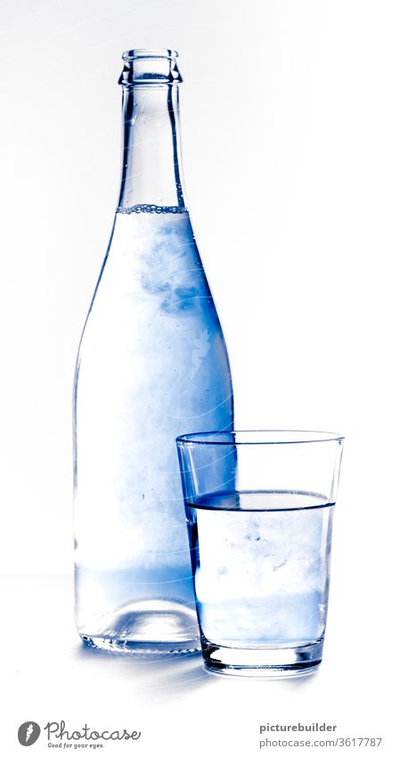 Bottle and glass with blue water bottle Glass Water Blue White Beverage Drinking Colour photo Fresh Deserted Healthy Food Breakfast Nutrition Interior shot Full