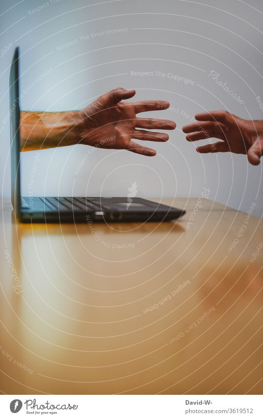 Hand comes out of the computer and grabs you by hand Grasp Computer Addiction Internet Advertising Criminality Online online trading Technology Human being