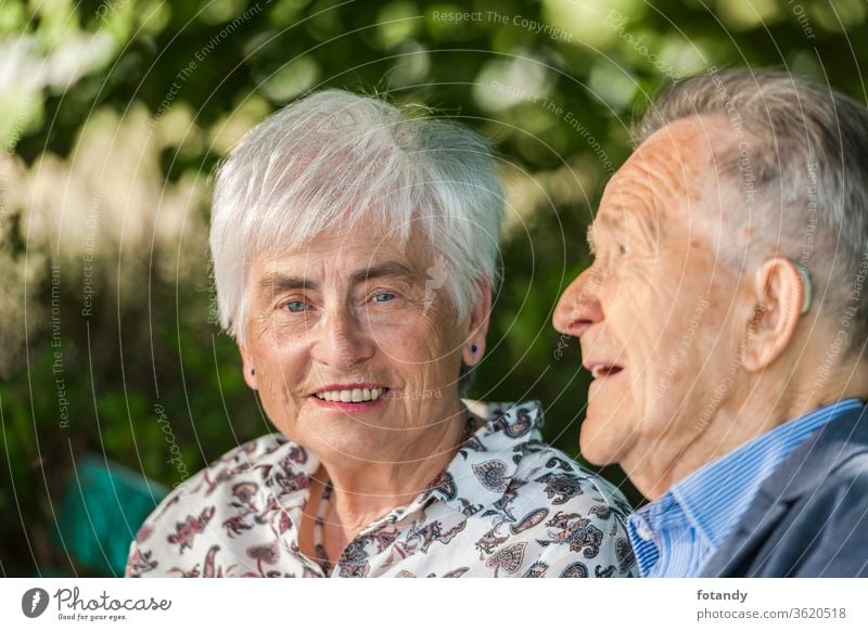 Head portrait of a retired couple Person Luck married Relationship Park Grandparents Feelings charming Partner close 2 attractive smiling Togetherness