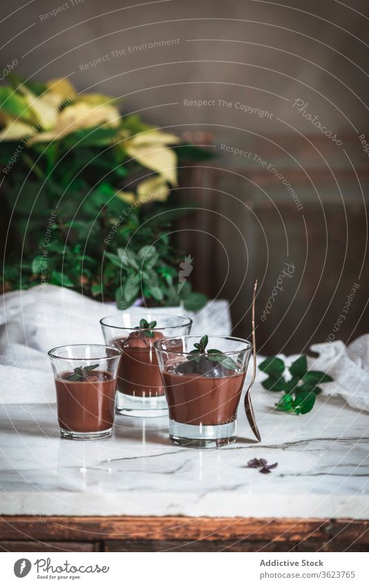 Mint mouse on glasses chocolate brown mousse composition decoration still life dessert sweet fresh delicious pastry sugar tasty gourmet patisserie