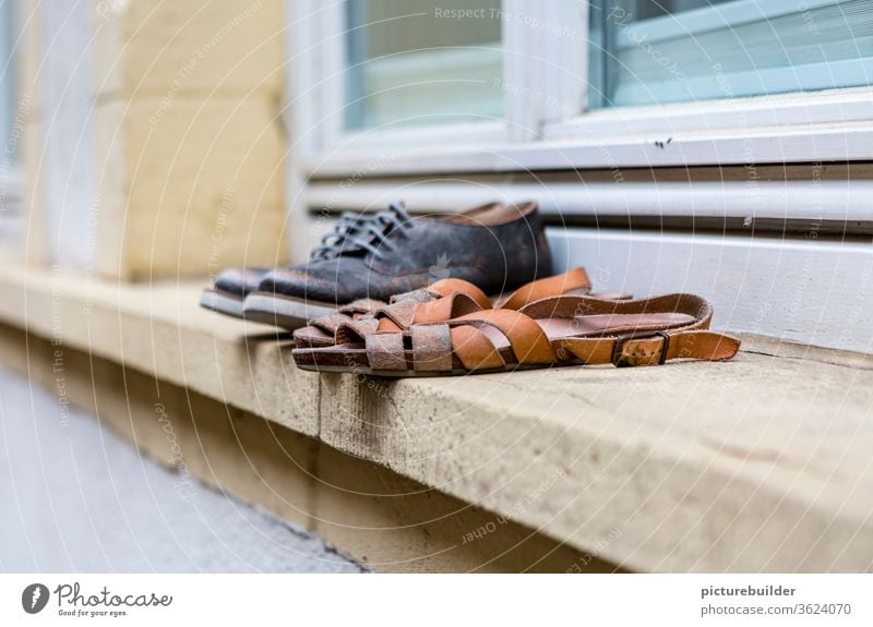Shoes on windowsill Footwear Sandal low shoe Window board Wall (barrier) Exterior shot two Couple Leather Fashion vintage daylight Copy Space top