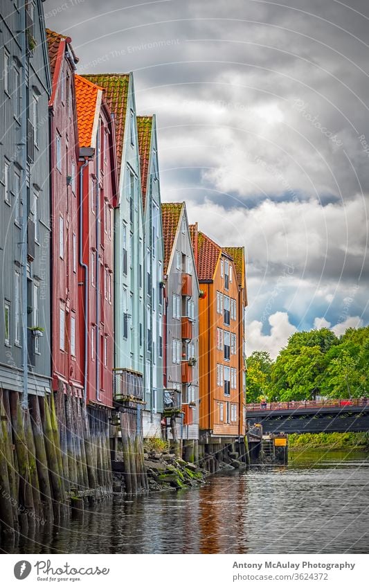 Trondheim River Nidelva Dockside Warehouses from the Water old trondheim river norway town nidelva wooden city water architecture colorful travel coast vintage
