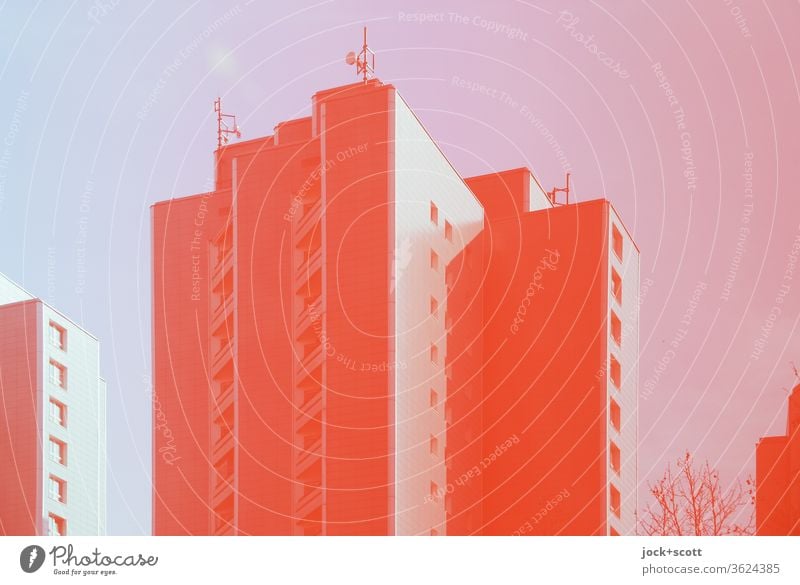 red sky, red transmitter masts, red prefabricated building Prefab construction Architecture Sky Tower block Facade Unicoloured Reflection Distinctive Symmetry