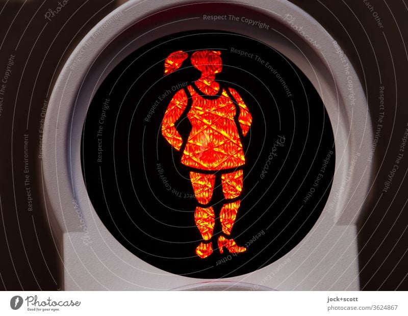 the Dutchwoman stands nonchalantly at the red light Isolated Image Braids Netherlands Period light signal Technology Pedestrian Traffic light Road sign