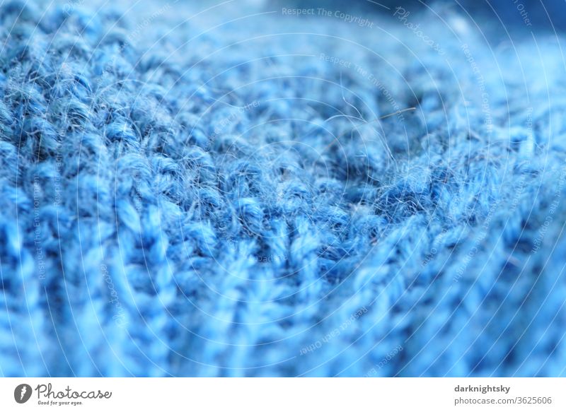 Close up of blue wool with a knitting pattern Wool Knit Leisure and hobbies Handcrafts Close-up Colour photo Soft Detail Contentment Warmth Cloth blue stain