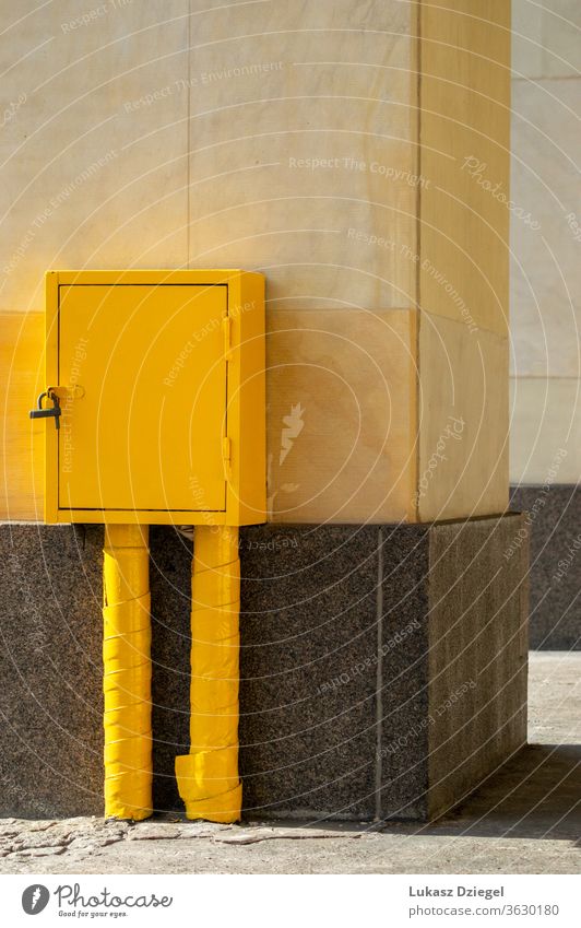 Yellow metal box textured lock hardware steel outdoors yellow box background black container open metallic object comfortable closeup build single tool easy