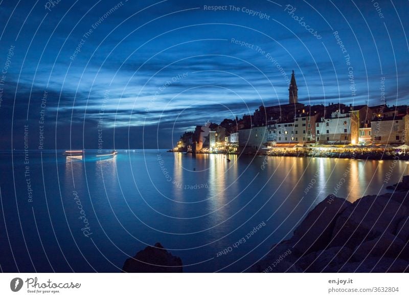 View of the port town Rovinj directly on the sea on the peninsula Istria in Croatia at the blue hour Europe Port City Evening Night Peninsula Old town