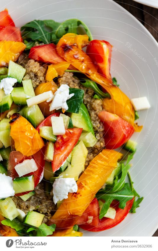Quinoa with vegetables and goat cheese quinoa salad healthy lifestyle food dinner eating vegan vegetarian plate pepper detox tomatoes diet cuisine lunch super