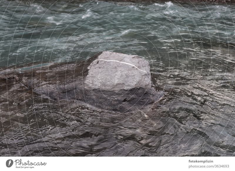 Stone with white line in the river Stone block Dashed line River Line Flow dash Stream Lined landmark Gray Current Rock Water Nature Movement Direction Brook