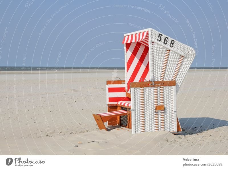 Beach chair on Baltrum Sandy beach East Frisland North Sea Lower Saxony beach chair beach chairs Northern Germany vacation Tourism free time Sky tourism voyage