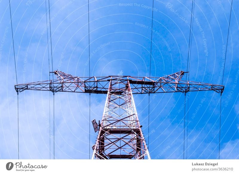 View of the power grid pylon on a sunny spring day cable danger distribution electrical electricity engineering environment equipment high industrial industry