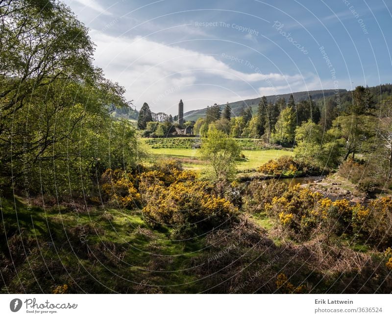 Beautiful landscape of Glendalough in the Wicklow Mountains of Ireland forest tourism travel wicklow nature outdoor sky ancient church monastery monastic lake