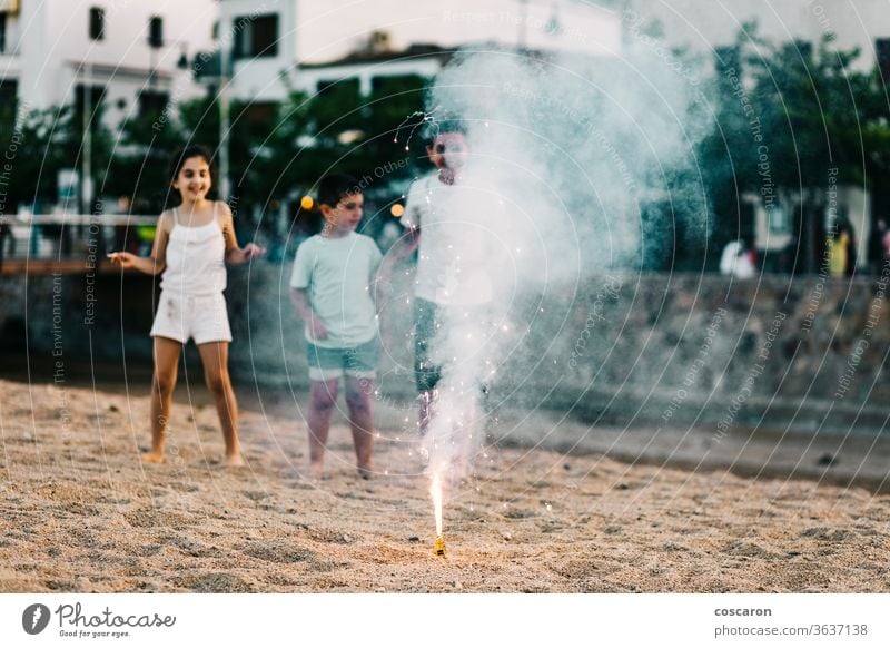 Group of kids looking fireworks 4th 4th of july 5th awe black celebrate celebration child childhood christmas colorful concept day enjoy event explosion family